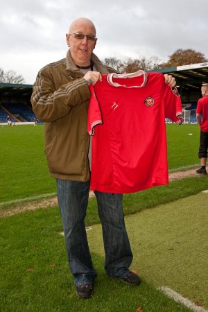 Mark O'Rourke at Gigg Lane with FC shirt